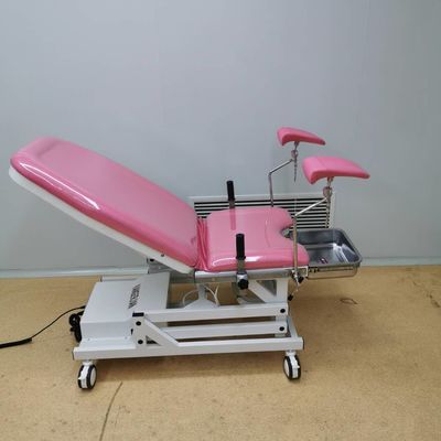 Rosa ostetrico speciale di colore del letto di ginecologia ostetrica elettrica del letto
