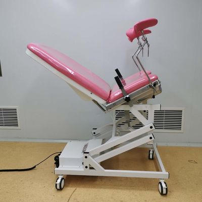 Rosa ostetrico speciale di colore del letto di ginecologia ostetrica elettrica del letto