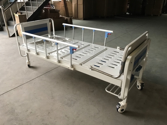 Un letto medico manuale blu e bianco di due funzioni per la clinica